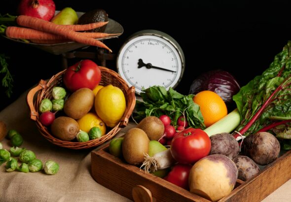 a wooden box filled with lots of different types of vegetables